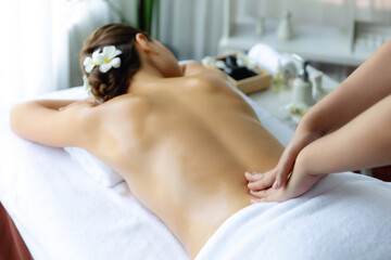 Caucasian woman customer enjoying relaxing anti-stress spa massage and pampering with beauty skin...
