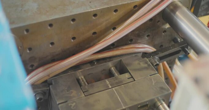 Injection molding thermoplastic machine. The process of creating a plastic part by injection molding. Plastic Injection Molding Industry