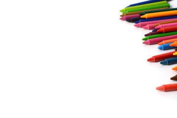Crayons lined up isolated on white background.