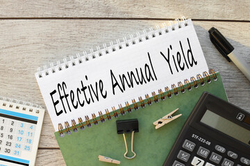 EAY - Effective Annual Yield. open notepad with text. near the calculator
