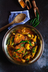 Katla Fish Curry with Seasonal Vegetables cooked in a traditional Bengali style