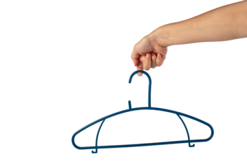 Plastic clothes hanger in hand isolated on transparent background 