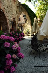 Italy, Emilia, Piacenza: Foreshortening of Medieval Village of Grazzano Visconti.