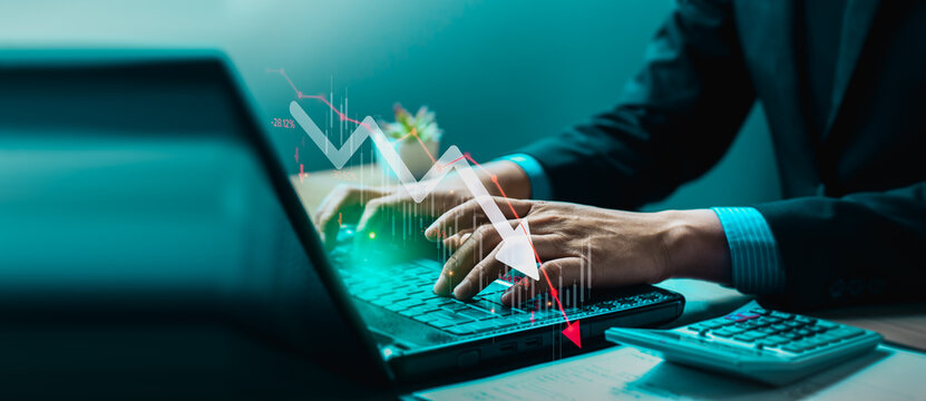 Economic collapse concept, businessman with falling financial graph chart due to global recession. Stock market crash, inflation, financial crisis, Falling income in GDP, capital reduction