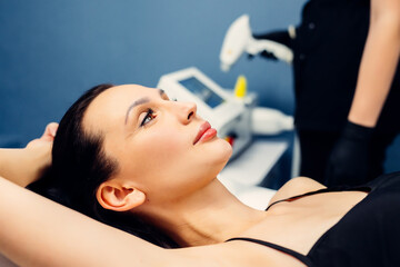 Flash diode laser hair removal in a cosmetologist's office, hair removal for smooth skin, laser...
