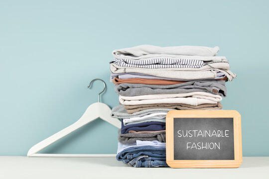 Black chalk board with eco friendly motivational quote on blue background.