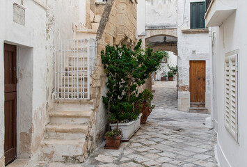 Fototapeta premium Polignano a Mare, Italy - one of the most beautiful cities on the Adriatic Sea, Polignano a Mare is a main landmark in Apulia. Here in particular its narrow alleyways 
