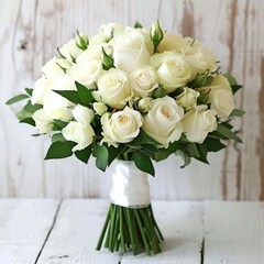 Fototapeta premium A bouquet of white roses on white wooden background