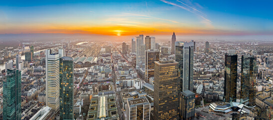 aerial view to skyline of Frankfurt with skyscraper in dawn and spectacular sunset