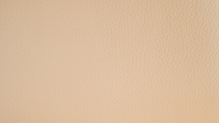 Light peach leather texture. Gentle and textured Peach Fuzz background