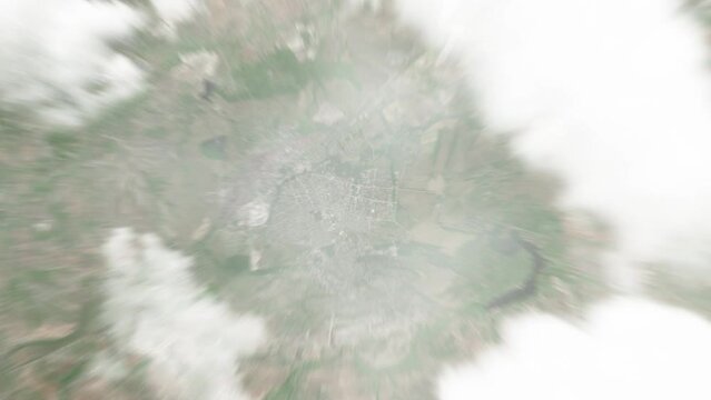 Earth zoom in from space to Alchevsk, Ukraine. Followed by zoom out through clouds and atmosphere into space. Satellite view. Travel intro. Images from NASA