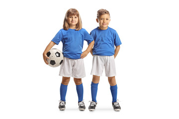 Boy and girl posing in blue and white football kits