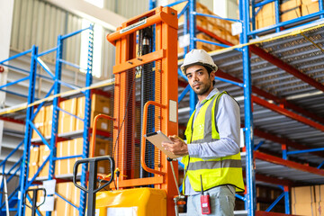 Portrait engineer man shipping order detail check goods and supplies on shelves with goods...