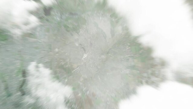 Earth zoom in from space to Makiivka, Ukraine. Followed by zoom out through clouds and atmosphere into space. Satellite view. Travel intro. Images from NASA