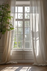 A window with a plant in front of it. Can be used to depict a peaceful and natural setting