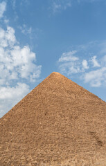 Fototapeta na wymiar Egyptian pyramid top against the sky