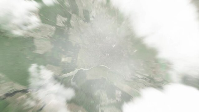 Earth zoom in from space to Zhytomyr, Ukraine. Followed by zoom out through clouds and atmosphere into space. Satellite view. Travel intro. Images from NASA