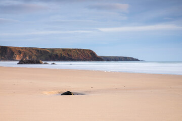 Fototapeta na wymiar Marloes Sands beach on the Pembrokeshire Coast in Wales at sunset