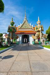 Statues of Giants in gate of temple demon guardians at Wat Arun