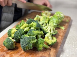 broccoli on a cutting board
