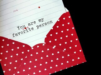 Love sweet heart letter with paper written YOU ARE MY FAVORITE PERSON, concept of telling someone...