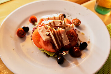 Tuna. Plate of tuna and tomato salad with Modena vinegar