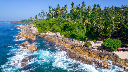 Beautiful Indian Ocean coastline on the island of Sri Lanka, Mirissa. Aerial photography.