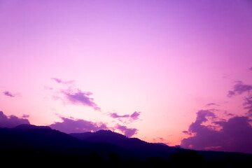 Dreamy purple sky twilight background and sunlight with copy space. Horizontal shape with space for design.