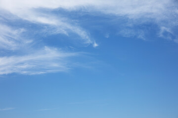 blue sky and fantastic soft white clouds ,  horizontal shape with space for design. Web banner....