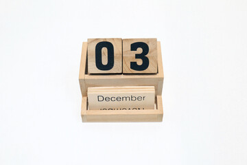 3rd of December wooden perpetual calendar. Shot close up isolated on a white background 