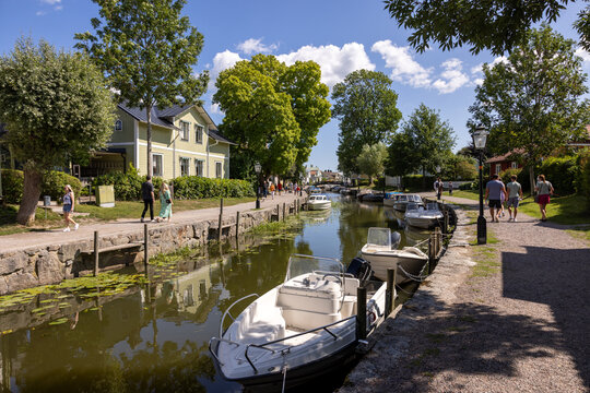  View of the Trosa river with moored pleasure boats  in the picturesque seaside town of Trosa in S&ouml;dermanland. Sweden.