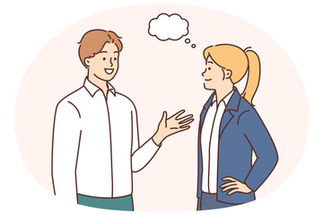 Fototapeta premium Smiling employees talking discussing ideas
