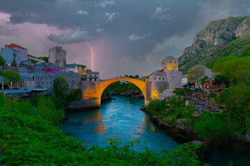 Historical Stari Most bridge over Neretva river in Mostar Old town, Balkan mountains, Bosnia and...