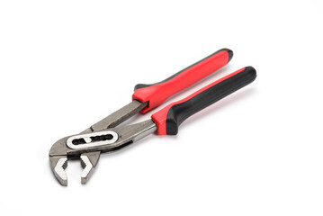 Red and black plumber pliers handle on white background.