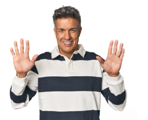 Middle-aged Latino man showing number ten with hands.