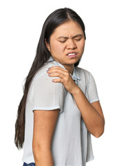 Young chinese woman isolated having a shoulder pain.