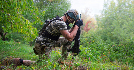 A soldier in the grass pray God