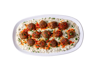 Traditional Turkish food; Meatballs on eggplant puree prepared with yogurt. local name; Alinazik kebab. Turkish name; Kofteli Alinazik kebabi - begendili kofte