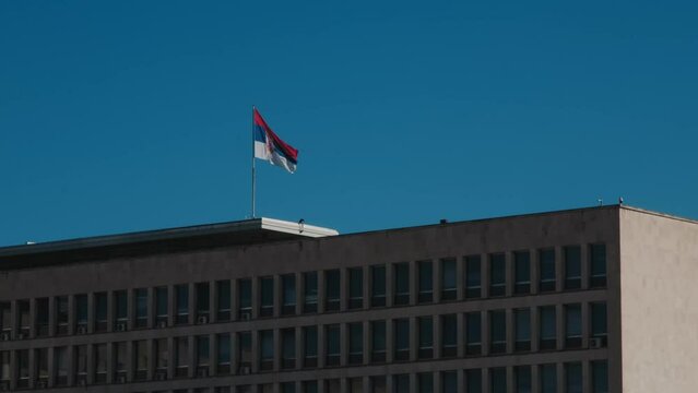 Palace of Serbia, New Belgrade district. Flag of Serbia waiving on the roof of Palata Srbija. Office of various state administrations in Belgrade