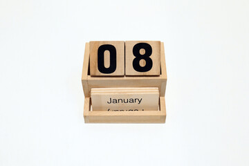 8th of January wooden perpetual calendar. Shot close up isolated on a white background 