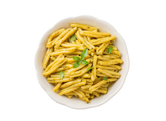 Casarecce pasta with cilantro pesto sauce on a grey background, top view. Delicious vegetarian lunch.