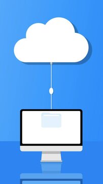 Un ordinateur fixe envoie des donn&eacute;es dans le cloud
