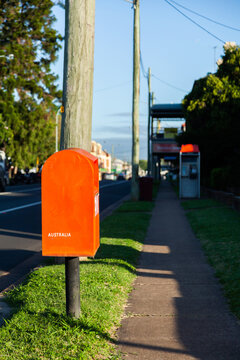 Red post box on Australian street