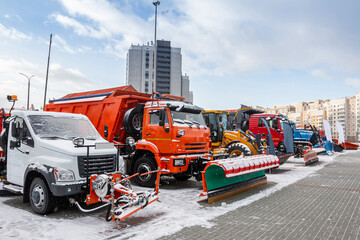 snowplow machinery at an industrial exhibition in winter