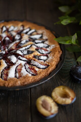 A photo of a homemade plum pie.