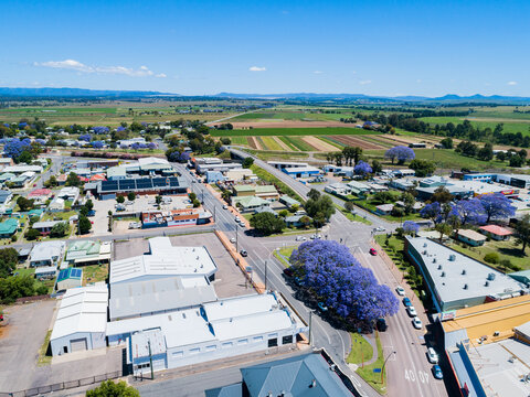 Road leading out of town on bright colourful spring day in Singleton