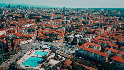 Milan city skyline aerial view. The theatrical performance shot from the Milan cityscape. Aerial footage. Milan drone footage