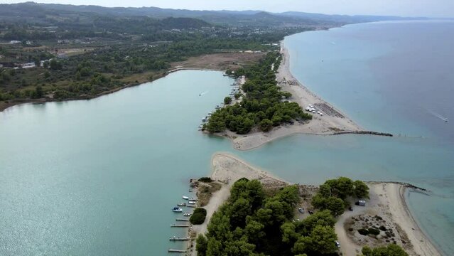 Upwards moving 4K drone clip over a peninsula in Paliouri, Chalkidiki in North Greece