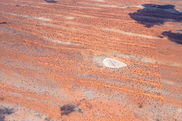 little pan and dune stripes in Kalahari, west of Stampriet, Namibia