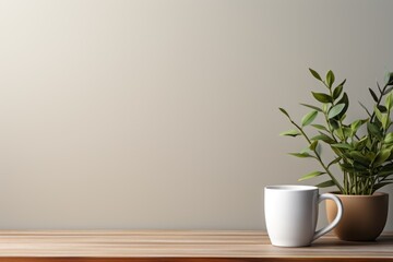 coffee cup and plant on wooden table. Backgrounds and textures, space for text